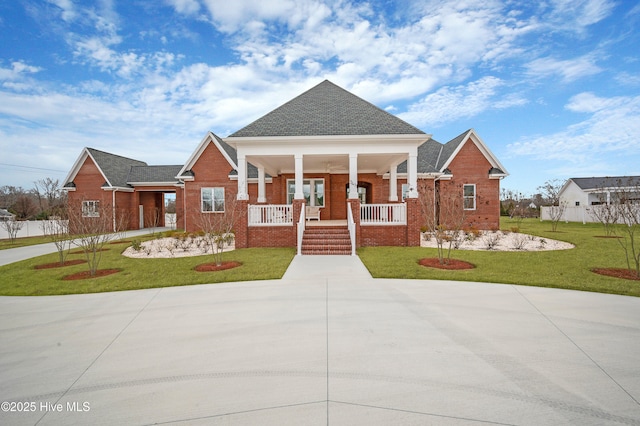 bungalow-style house with a porch and a front yard