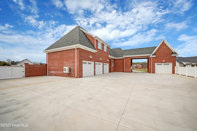 view of property exterior with a garage