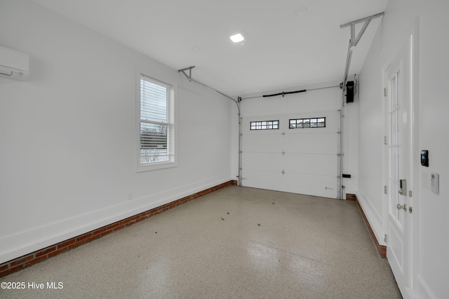 garage with a wall mounted air conditioner