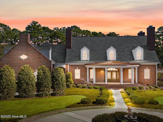 4174 Brookfield Way, Southport, NC 28461 - view of front of property featuring a chimney, brick siding, a gazebo, and a front lawn