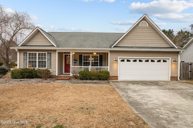 ranch-style house with a garage and a porch