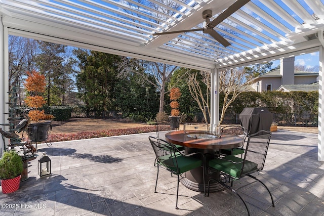 view of patio / terrace featuring ceiling fan, area for grilling, and a pergola