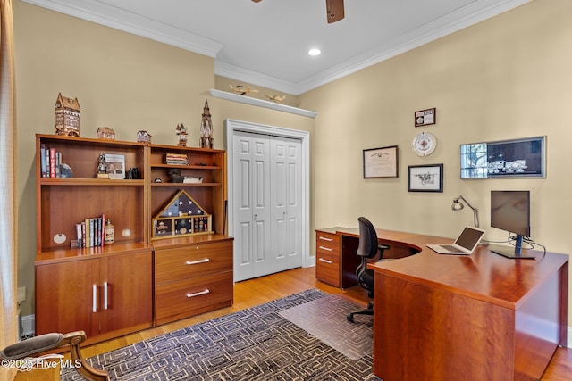 home office featuring hardwood / wood-style flooring, ceiling fan, and ornamental molding