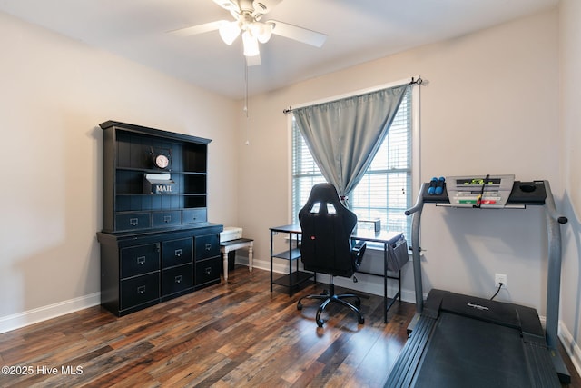 office area with dark wood-type flooring and ceiling fan