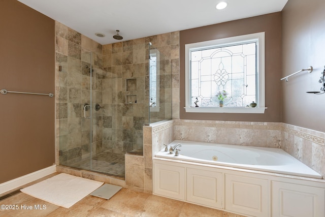 bathroom with independent shower and bath