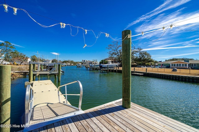 dock area featuring a water view