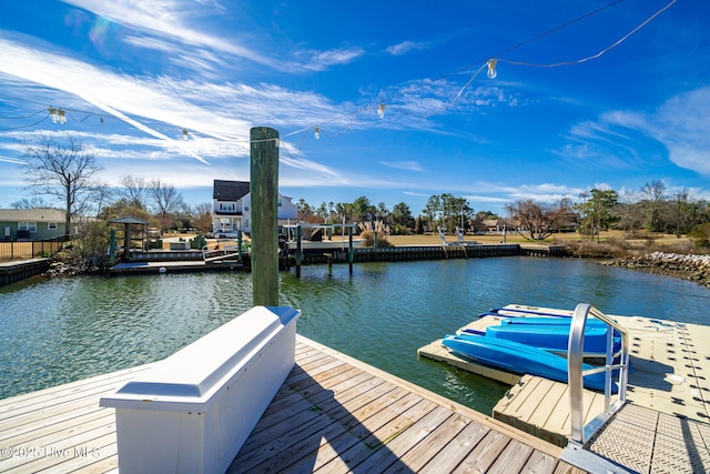 view of dock with a water view