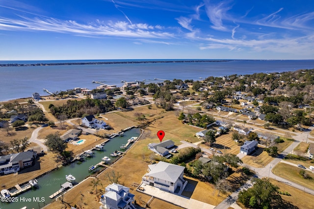 aerial view featuring a water view and a residential view