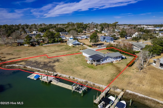 aerial view with a residential view and a water view