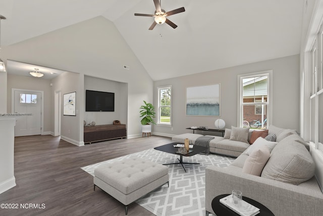 living room with wood-type flooring, high vaulted ceiling, and ceiling fan