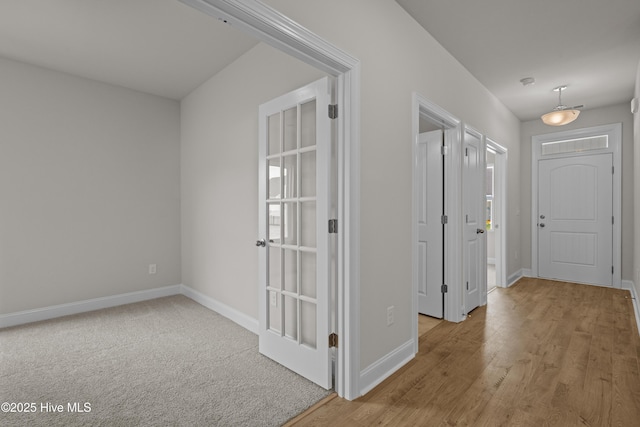 1200 Calabash Station Blvd NW, Calabash, NC 28467 - corridor with baseboards and wood finished floors