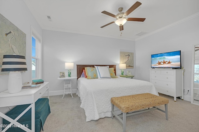 bedroom with ceiling fan, light colored carpet, and ornamental molding