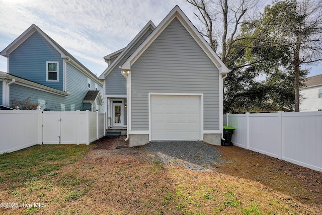 back of house featuring a yard