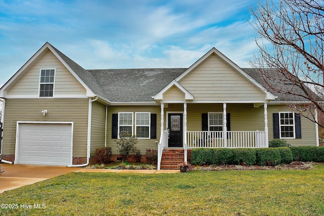 view of front of property with a garage, a porch, and a front lawn