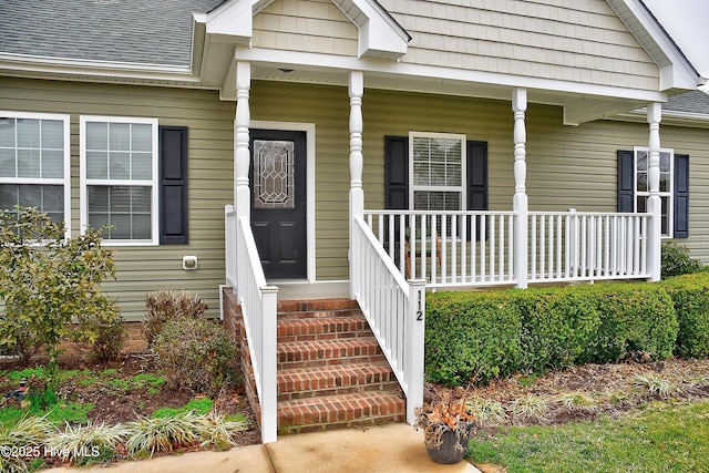 doorway to property with a porch