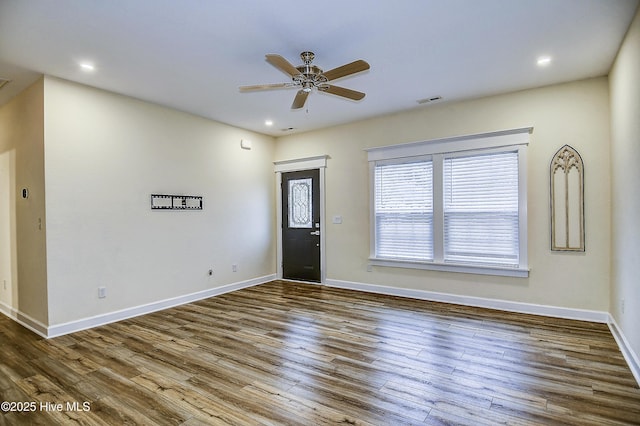 entryway featuring wood-type flooring and ceiling fan