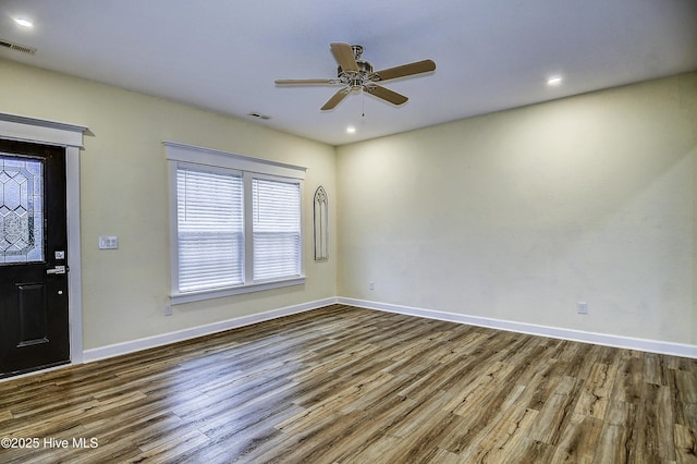 entrance foyer with wood-type flooring and ceiling fan