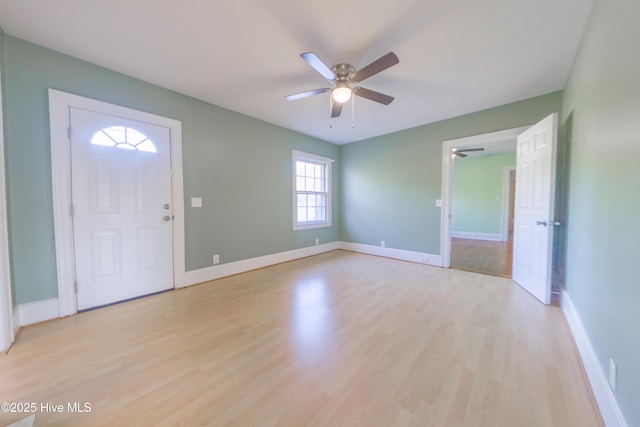 entryway featuring ceiling fan and light wood-type flooring