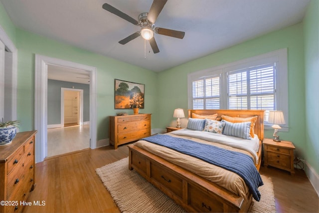 bedroom featuring ceiling fan and light wood-type flooring