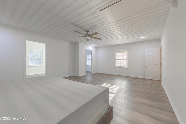 spare room featuring ceiling fan and light wood-type flooring