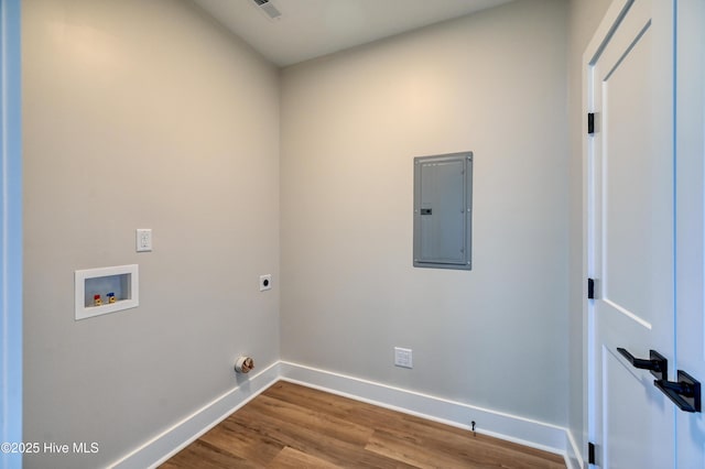 laundry area featuring hardwood / wood-style floors, hookup for an electric dryer, washer hookup, and electric panel