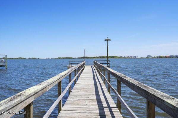 view of dock with a water view