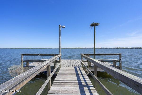 view of dock featuring a water view