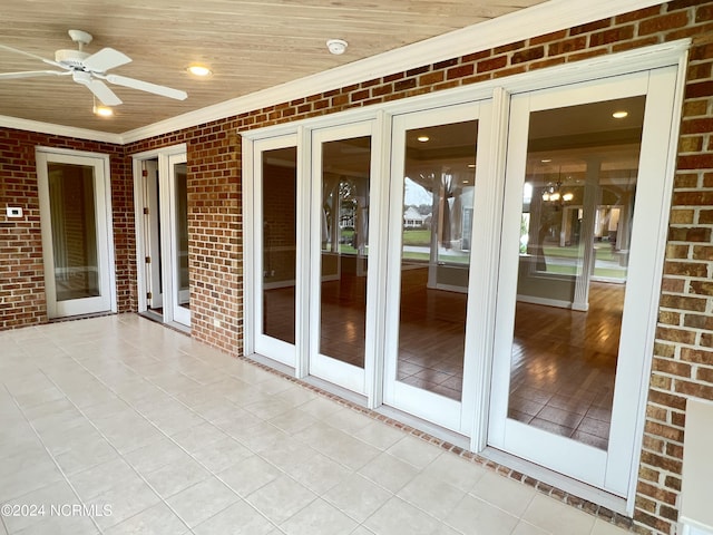 exterior space featuring ceiling fan