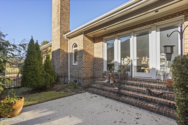 property entrance with a patio area