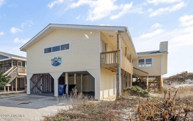 exterior space featuring a balcony