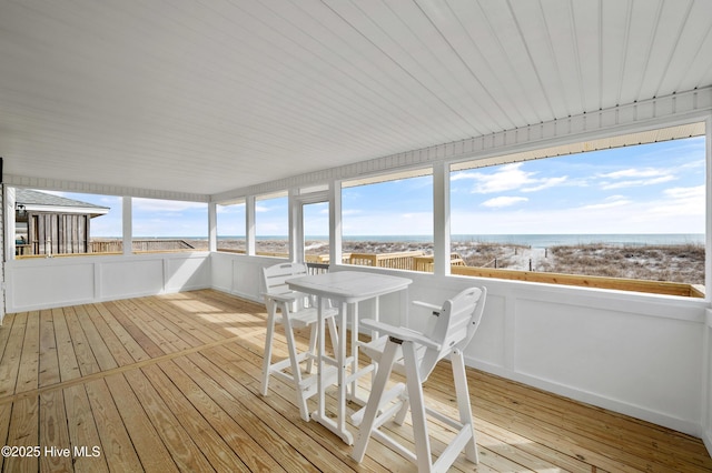 unfurnished sunroom with a wealth of natural light