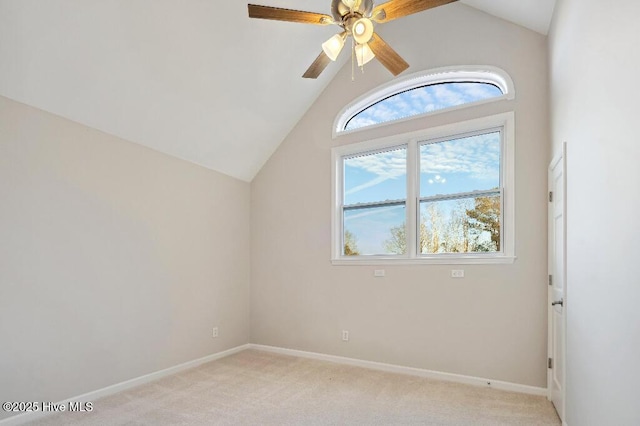 additional living space featuring ceiling fan, light colored carpet, and lofted ceiling