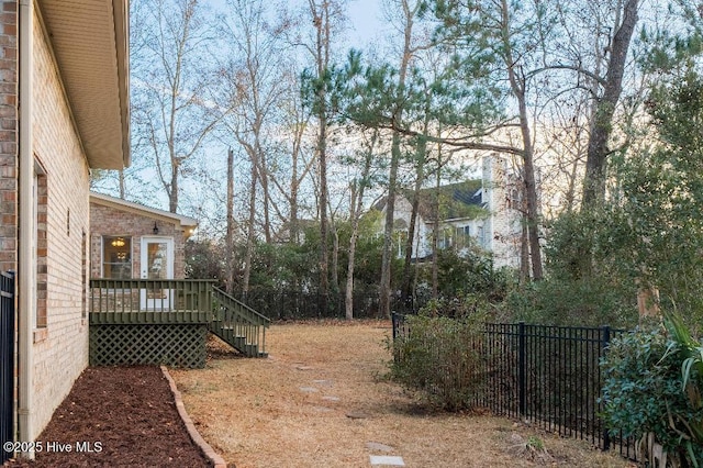 view of yard with a deck