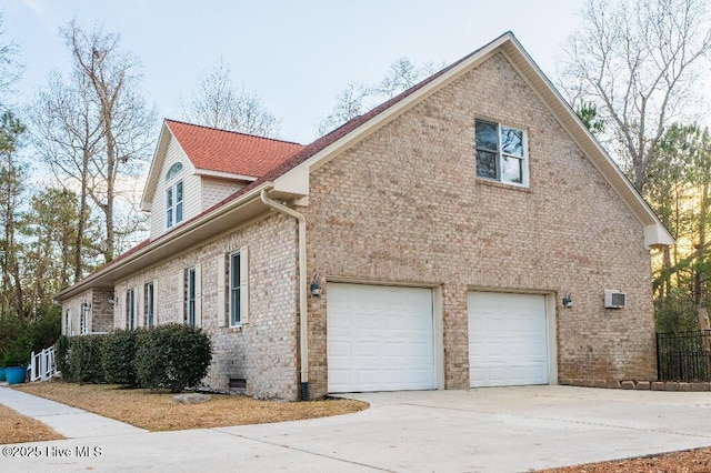 view of home's exterior with a garage