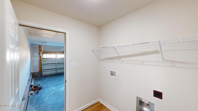 washroom featuring hookup for a washing machine and electric dryer hookup