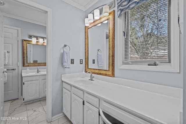 bathroom featuring ornamental molding, marble finish floor, and vanity