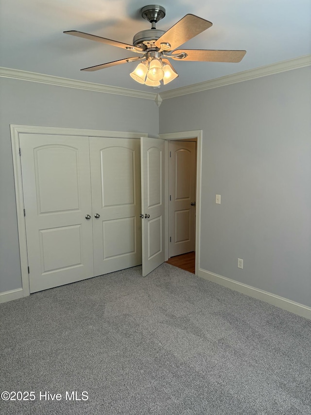 108 Casey Ct, Cedar Point, NC 28584 - unfurnished bedroom with crown molding, carpet floors, baseboards, a closet, and a ceiling fan