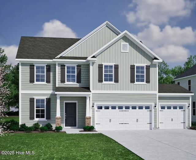 craftsman-style home featuring a garage and a front yard