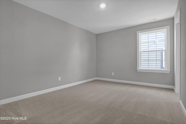 view of carpeted spare room