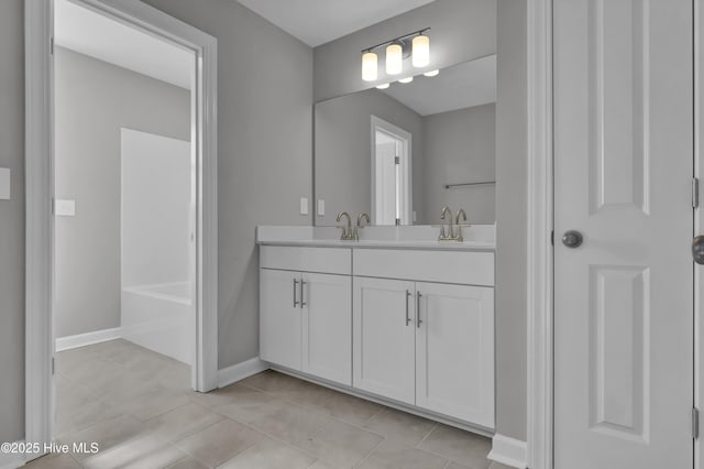 bathroom featuring vanity and tile patterned flooring