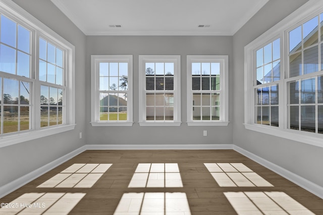 unfurnished sunroom with a healthy amount of sunlight