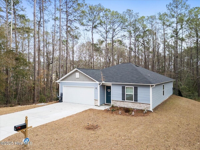 ranch-style house featuring a garage