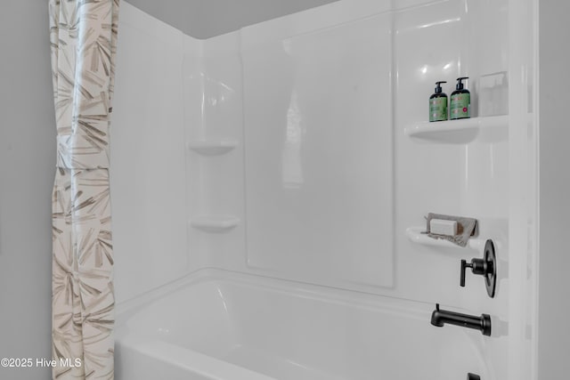 bathroom featuring shower / bathtub combination with curtain