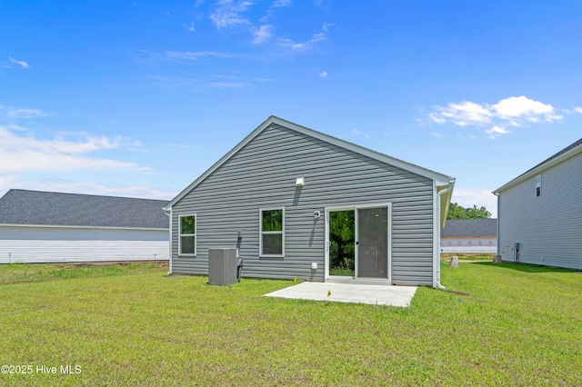 6986 Seaside Palms Pl SW, Sunset Beach, NC 28468 - rear view of property featuring a patio and a yard