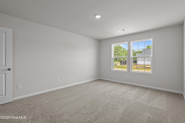 6986 Seaside Palms Pl SW, Sunset Beach, NC 28468 - carpeted spare room with baseboards
