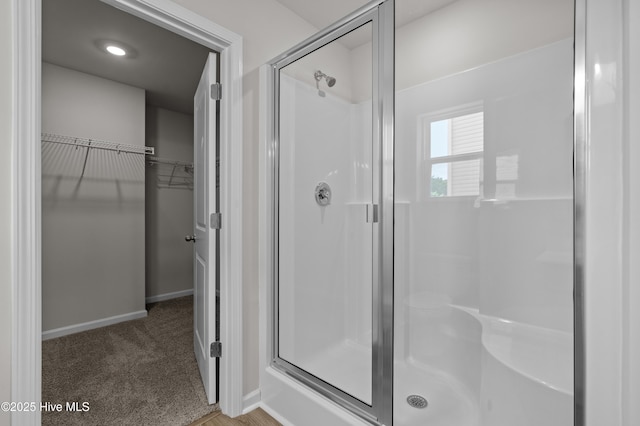 6986 Seaside Palms Pl SW, Sunset Beach, NC 28468 - full bath featuring a stall shower and a spacious closet