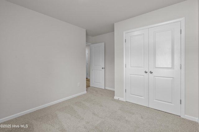 6986 Seaside Palms Pl SW, Sunset Beach, NC 28468 - unfurnished bedroom with carpet and a closet