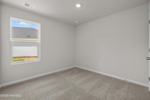 6986 Seaside Palms Pl SW, Sunset Beach, NC 28468 - spare room with carpet floors and plenty of natural light