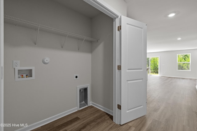 6986 Seaside Palms Pl SW, Sunset Beach, NC 28468 - laundry room with hookup for an electric dryer, washer hookup, wood finished floors, hookup for a gas dryer, and recessed lighting
