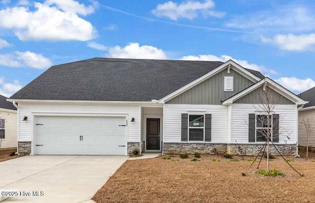 craftsman house with a garage